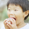 Boy eating Apple