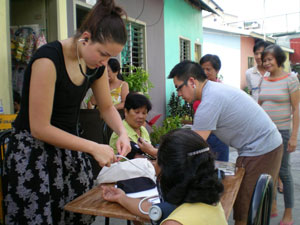 Natalie Hale, left, improved access to dental care in Quezon City, Manila.