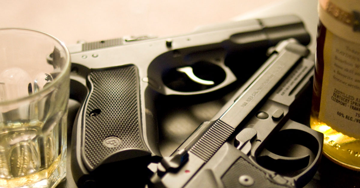 gun and alcohol photo