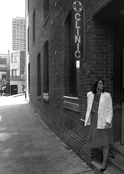 Christine Hurley poses outside the Pike Market Medical Clinic