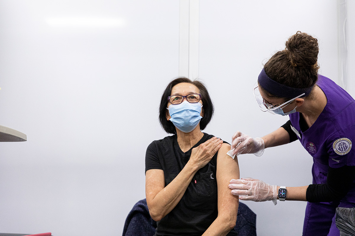 UW Northwest Hospital employee receives a COVID-19 vaccination