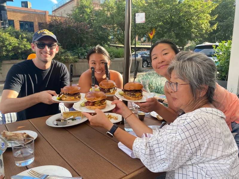 Amandi Li and family eating burgers