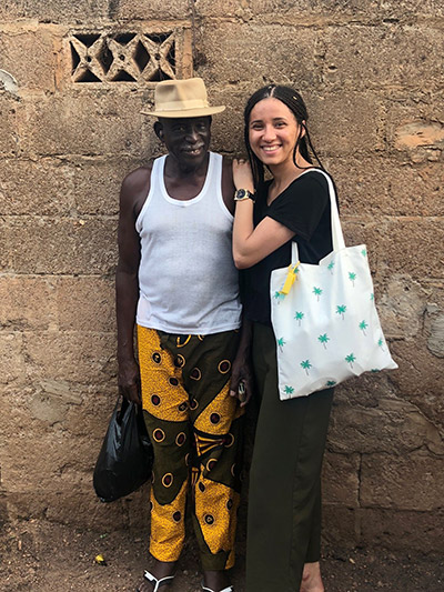 Chistelle with her grandfather, Ouanlourgo Silué, in Ivory Coast.