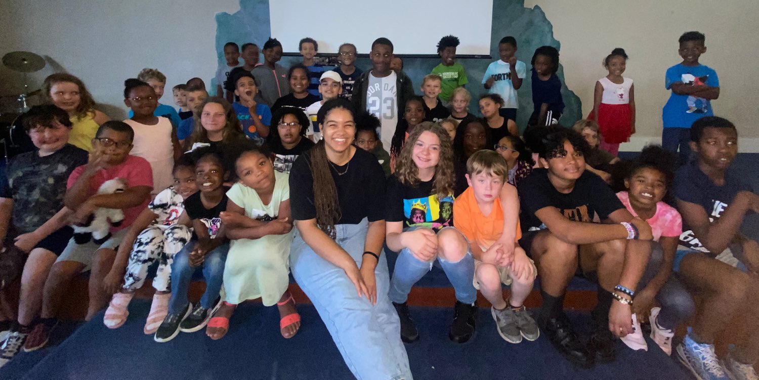 Brittney Dias with children at the Tacoma Community Center