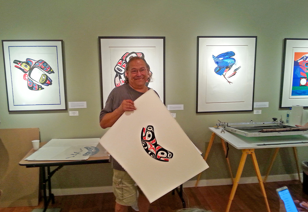Marvin Oliver with a print of the Soul Catcher