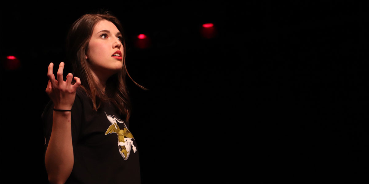 Emma Spickard performs in an improv show at the Samuel E. Kelly Ethnic Cultural Center.