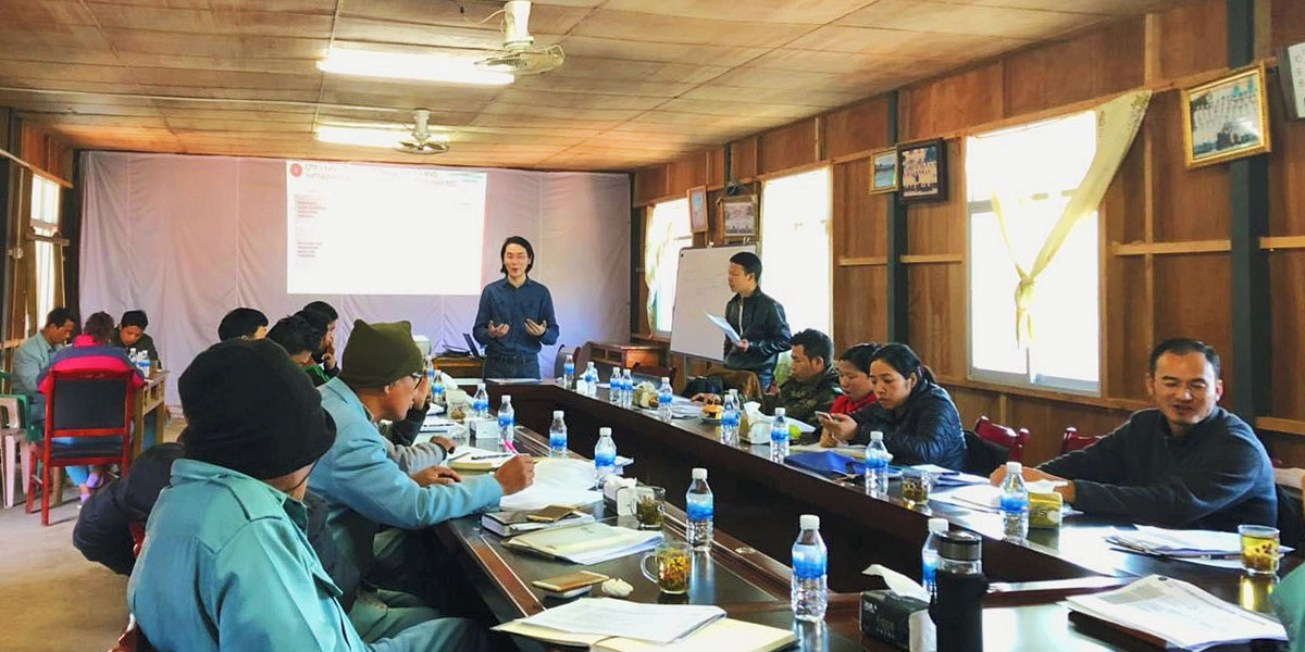 Yingxi Zhao leads a meeting with community partners