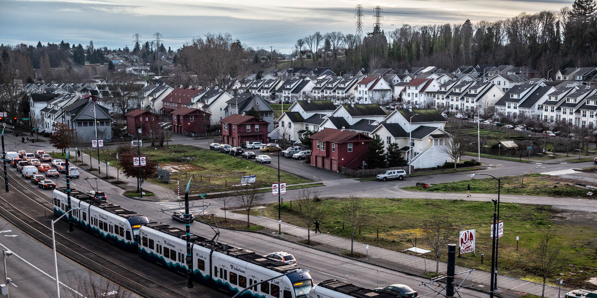 Housing by a link light rail rapid transit station in the Seattle area.