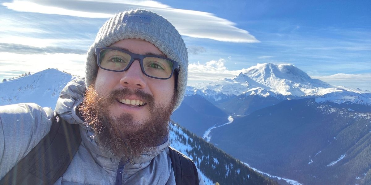 Horacio Chacon Torrico with Mt. Rainier in the background